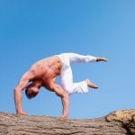 Man wearing white pants under blue sky