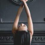 Woman bending her body