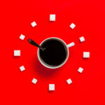 White mug on red background
