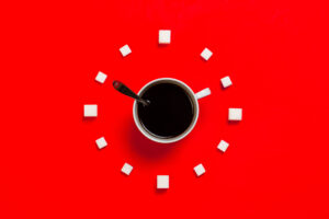 White mug on red background