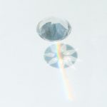 Diamond on white surface