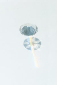 Diamond on white surface